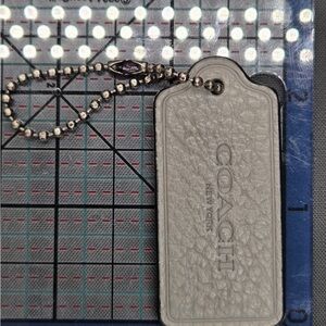 Coach Silver Leather Bag Tag
